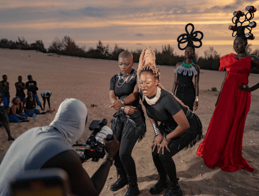 Def Mama Def perform during the Clima Yakaar music video shoot near Lac Rose