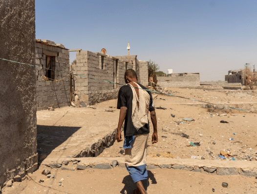 Yousef, 40, in Cheikh Othman, Yemen, where he shares a small tent with ten family members